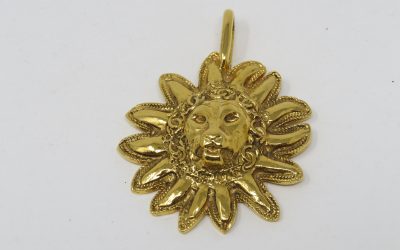 Chanel: a Gold Lion Head Pendant