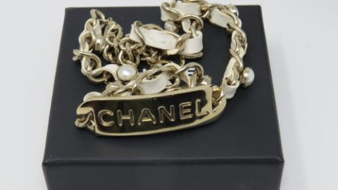 Chanel: a White Logo Tag Choker